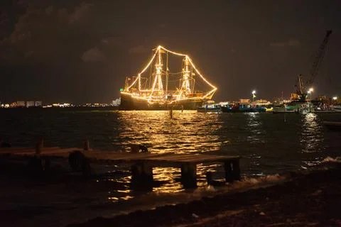 Ship glowing in the sea Stock Photos