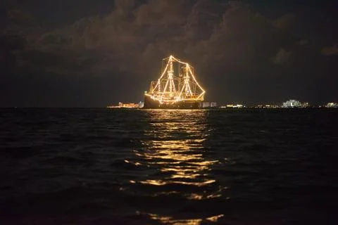 Ship glowing in the sea Stock Photos