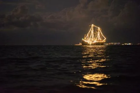 Ship glowing in the sea Stock Photos