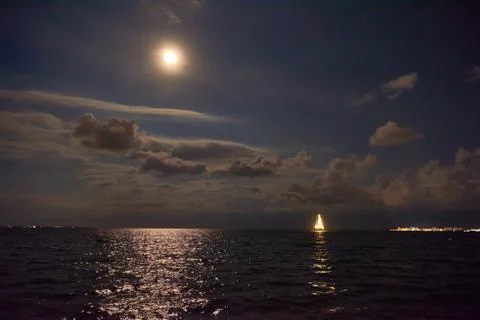 Ship glowing in the sea Stock Photos