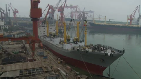 Ship in harbor, dockyard cranes, China Stock Footage 54430369