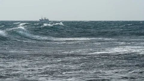Ship on the horizon at storm Stock Footage 69715180