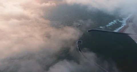 Ship infront of habour through the clouds sunset aerial Video stock 153519738