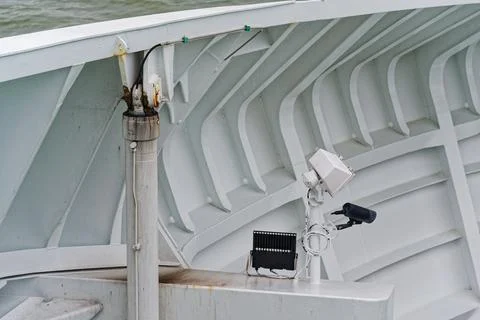Ship inner wall camera and light mounted on support post Stock Photos