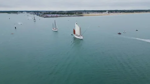 Ship Le Bische leaving the port of Ouistreham, France. 4K drone Stock Footage 313362876