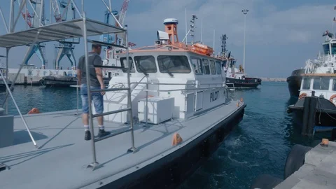A ship leaves the dock Stock Footage 118761693