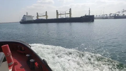 A ship leaves port 2 Stock Footage 118761826