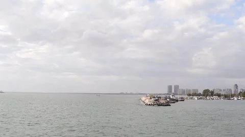 Ship leaving the Harbor in Cloudy Day Stock Footage 299257553