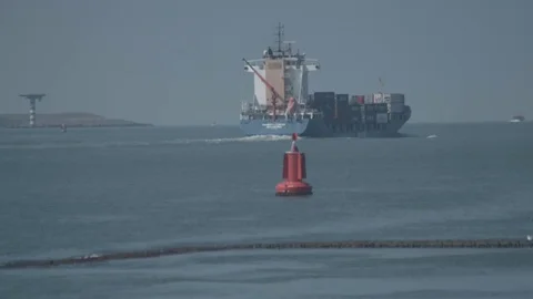 Ship leaving the harbor to the ocean Stock Footage 74289650