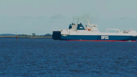 Ship Leaving Hull sailing through the river Humber Estuary Stock Footage 253125836