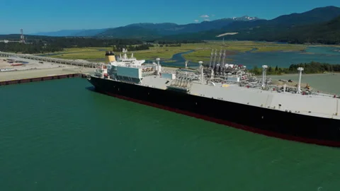 A ship at a LNG loading facility in northern British Columbia Stock Footage 318022973