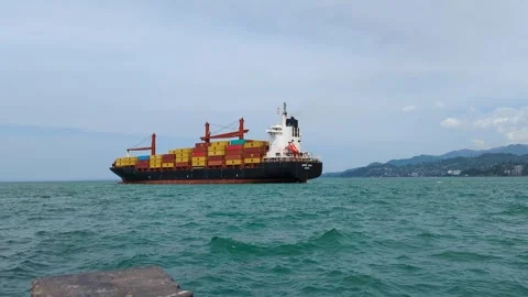 A ship loaded with containers is sailing Stock Footage 242034095
