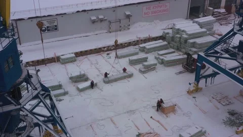 The ship is loaded in port in the winter by timber. Stock Footage 148764720