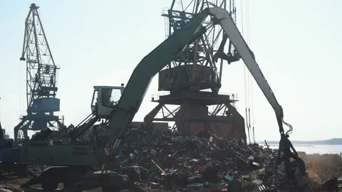 Ship loader scrap in harbor,Freight train, ship and scrap metal in port Video stock 99243303