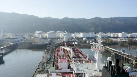 Ship Loading Cargo at a Fuel Depot in Portland Oregon Industrial area Stock Footage 145054153