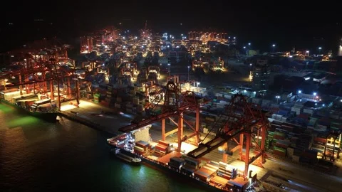 Ship logistics night time lapse. Sea port boat load cargo containers hyperlapse. Stock Footage 340646665