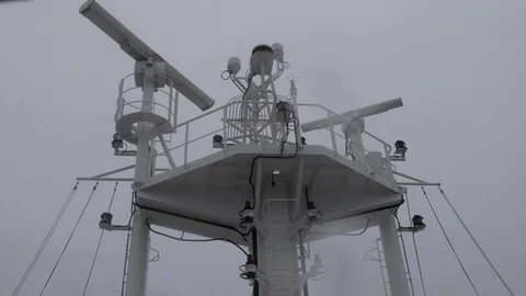 Ship mast with navigation devices and radar transmitter X band and S band Stock Footage 115056768