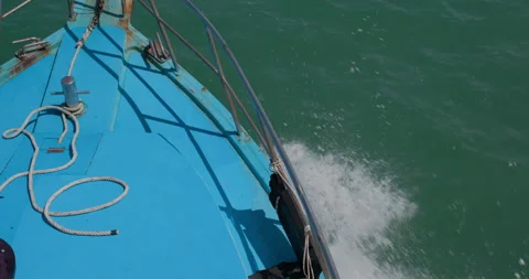 Ship motor creates waves on the surface of the ocean Stock Footage 131028539