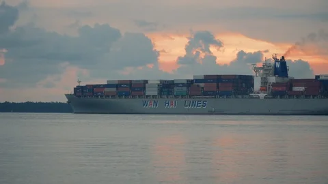 Ship moving and docking during sunset at Port Klang Stock Footage 99796044