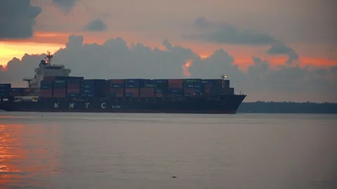 Ship moving and docking during sunset at Port Klang Stock Footage 99810012