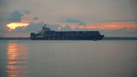 Ship moving and docking during sunset at Port Klang Stock Footage 99810013