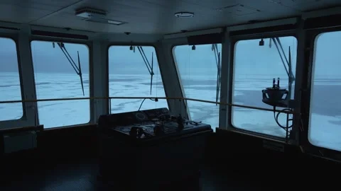 Ship. Navigation bridge. Control panel on wing. Frozen sea outside. Big windows Vidéo 240844374