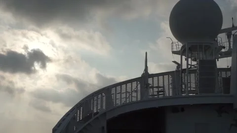 Ship Navy Antenna Radar rotating during sunrise. Stock-Footage 135384959