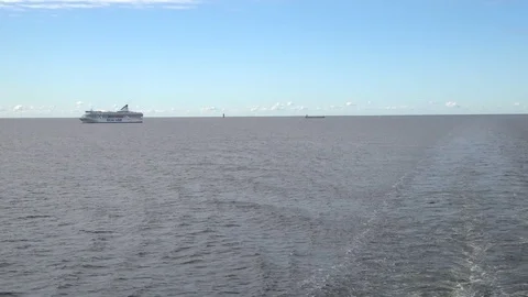 Ship in the open sea and Wake trail Stock Footage 110304004