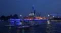 Ship parade at blue illuminated docks in Hamburg harbour HD Footage