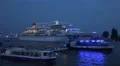 Ship parade with cruise ship Europa blue illuminated Hamburg harbour HD Footage