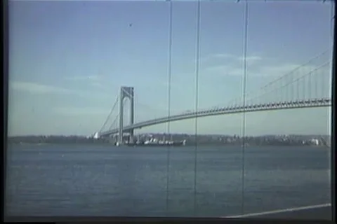 Ship pass beneath the Throg's Neck Bridge - 1970 Stock Footage 99784966