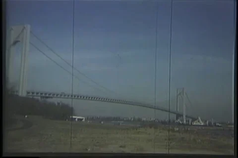 Ship pass beneath the Throg's Neck Bridge - 1970 Stock Footage 99784978