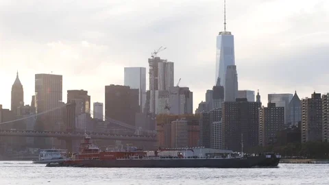 A ship passes in front of NYC's World Trade Center in the East River Stock Footage 70236083