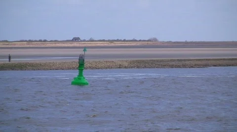 Ship passing buoy and lighthouse Stock Footage 705663