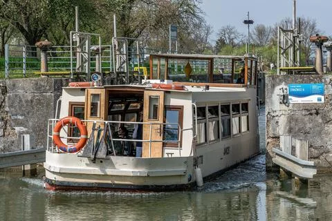 A ship passing through the locks in Straznice in South Moravia Stock Photos