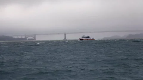 Ship passing through wavy water with high current. Stock Footage 135798295