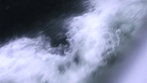 Ship passing through wavy water with high current. Stock Footage 135798331