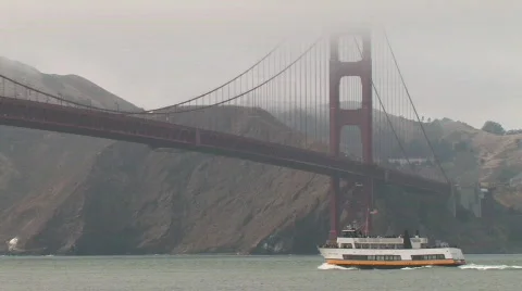 Ship passing under the Golden Gate Bridge Stock Footage 146928