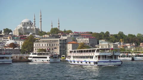 Ship pulls away from the shore in Istanbul, Turkey Stock Footage 232131558