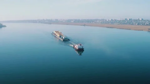 A ship pulls a tanker - Aerial top down Stock Footage 156567454