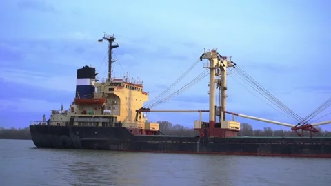 The ship is in a queue in the river port. A cargo ship is at anchor. Stock Footage 235943013