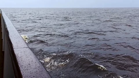 Ship railing over churning dark water. Stock Footage 341107268