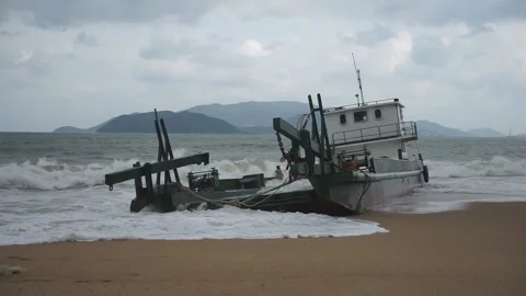 Ship ran aground on coast Video stock 139218806