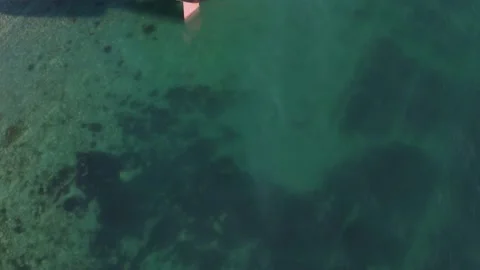 The ship ran aground. Environmental pollution at sea. Aerial view. grounded ship Stock Footage 136469363