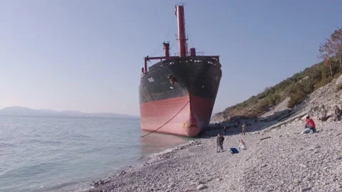 The ship ran aground. Environmental pollution at sea. Aerial view. grounded ship Stock Footage 137652374