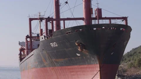 The ship ran aground. Environmental pollution at sea. Aerial view. grounded ship Stock Footage 137652757