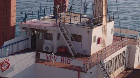 The ship ran aground. Environmental pollution at sea. Aerial view. grounded ship Stock Footage 137654425