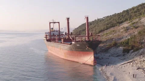 The ship ran aground. Environmental pollution at sea. Aerial view. grounded ship Stock Footage 137654802