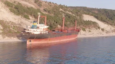 The ship ran aground. Environmental pollution at sea. Aerial view. grounded ship Stock Footage 137654884