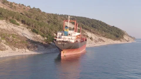 The ship ran aground. Environmental pollution at sea. Aerial view. grounded ship Stock Footage 137655194